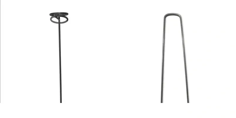 Two black metal hooks with curved ends and circular handles.