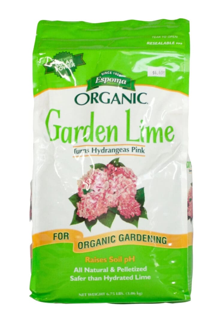 Organic Garden Lime fertilizer bag with flowers on the label.